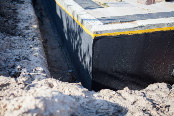 Professional Waterproofing technician working in Moline, MI